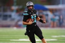 Silverado's Brandon Tunell (11) runs the ball against Palo Verde during the first half of a foo ...