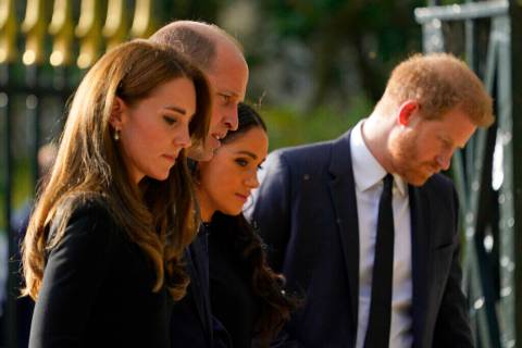 Britain's Prince William and Kate, Princess of Wales, left, and Britain's Prince Harry and Megh ...
