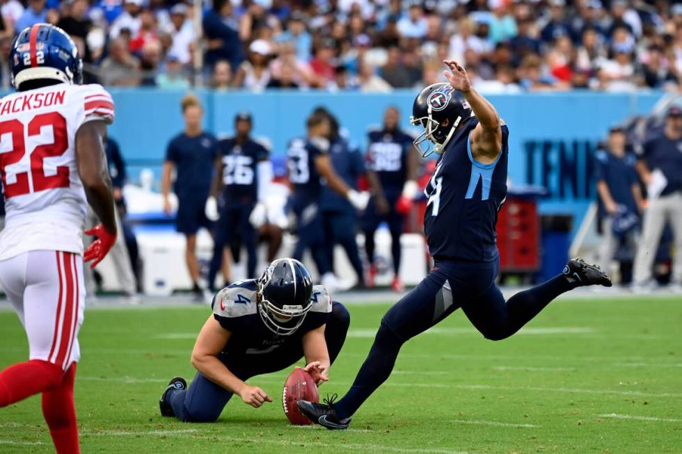 Tennessee Titans place kicker Randy Bullock (14) kicks a field goal during the first half of an ...