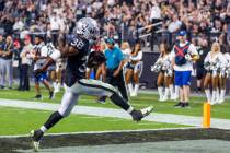Raiders running back Brittain Brown (38) celebrates into the end zone versus the New England Pa ...