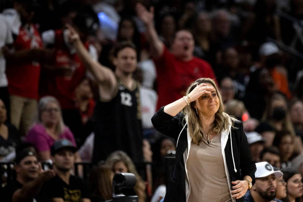 Las Vegas Aces head coach Becky Hammon reacts to her team getting a shot clock violation during ...