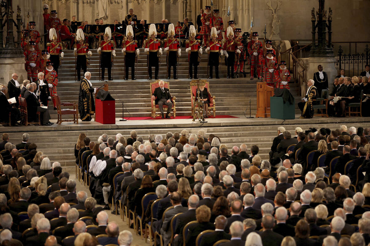 Members of Parliament attend a visit by Britain's King Charles III and Camilla, the Queen Conso ...