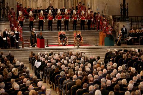 Members of Parliament attend a visit by Britain's King Charles III and Camilla, the Queen Conso ...