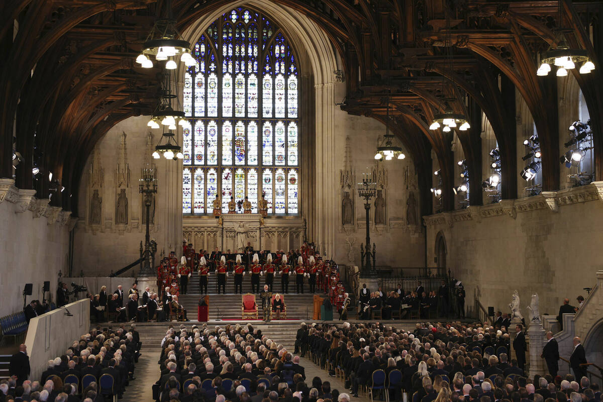 King Charles III makes his address as Camilla, the Queen Consort listens, in Westminster Hall, ...