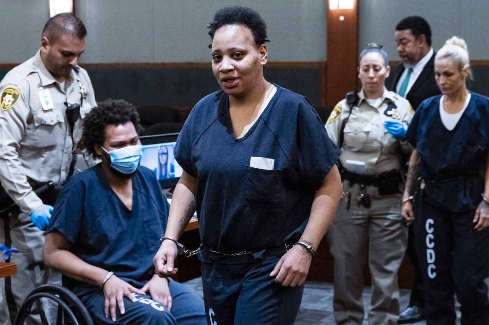 Fatima Mitchell, center, led out of the courtroom after her sentencing at the Regional Justice ...