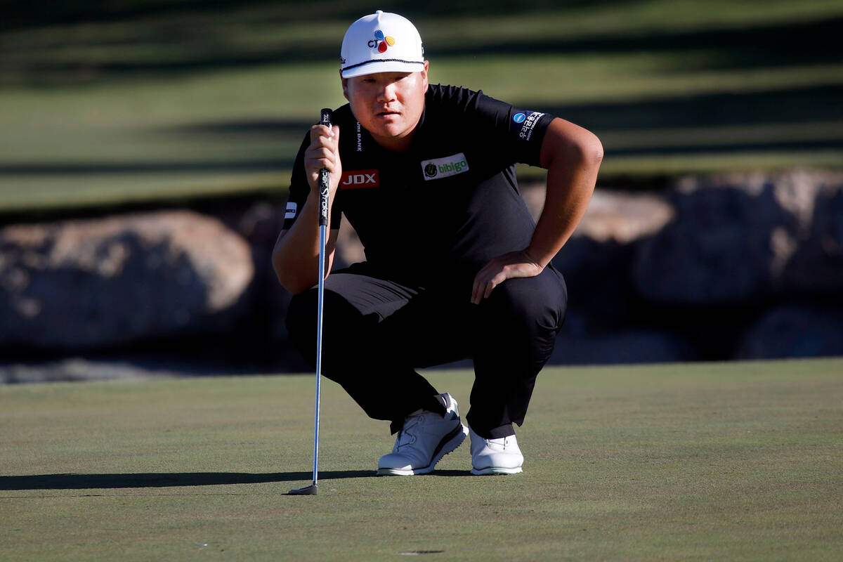 Sungjae Im lines up a putt on the 16th green during the final round of the Shriners Hospitals f ...