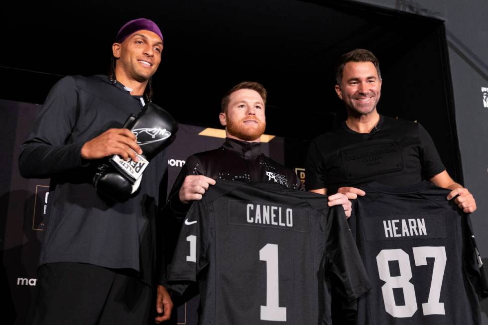 Raiders wide receiver Mack Hollins, from left, boxer Saul "Canelo" Alvarez, and boxin ...