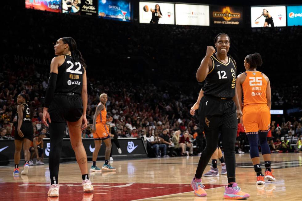 Las Vegas Aces guard Chelsea Gray (12) celebrates as the Connecticut Sun make a shot clock viol ...