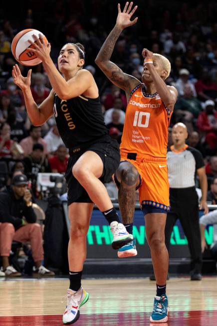 Las Vegas Aces guard Kelsey Plum (10) shoots against Connecticut Sun guard Courtney Williams (1 ...