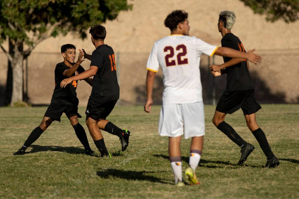 Chaparral's Adrian Ocampo (24) and Irvin Aguirre (19) celebrate a goal against Eldorado at Chap ...