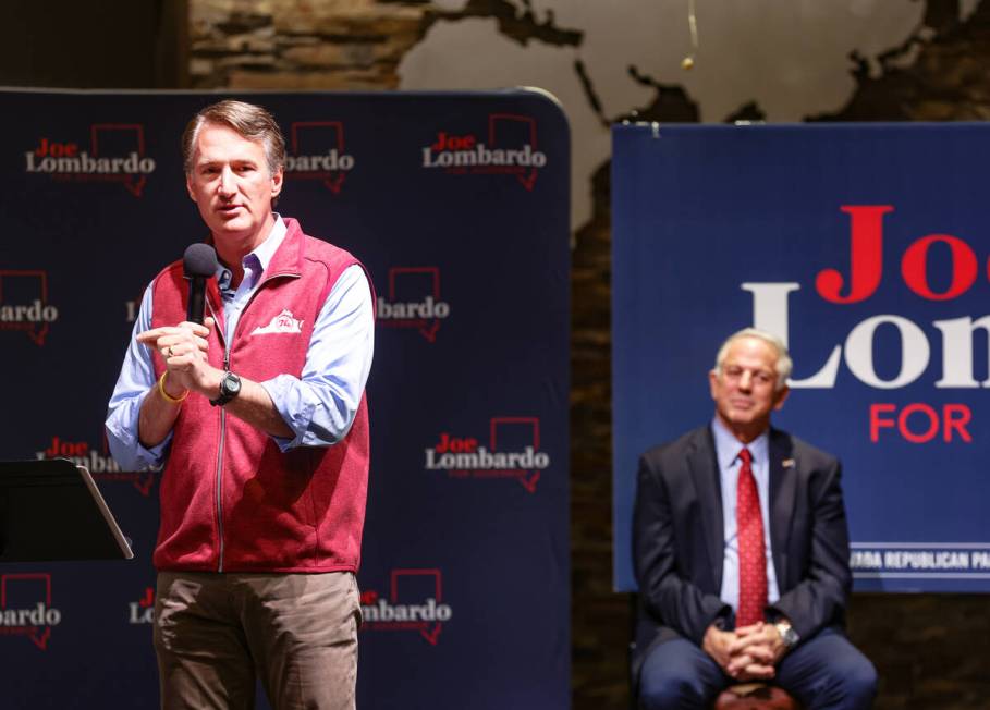 Virginia Gov. Glenn Youngkin, left, campaigns for Republican candidate for governor Sheriff Joe ...