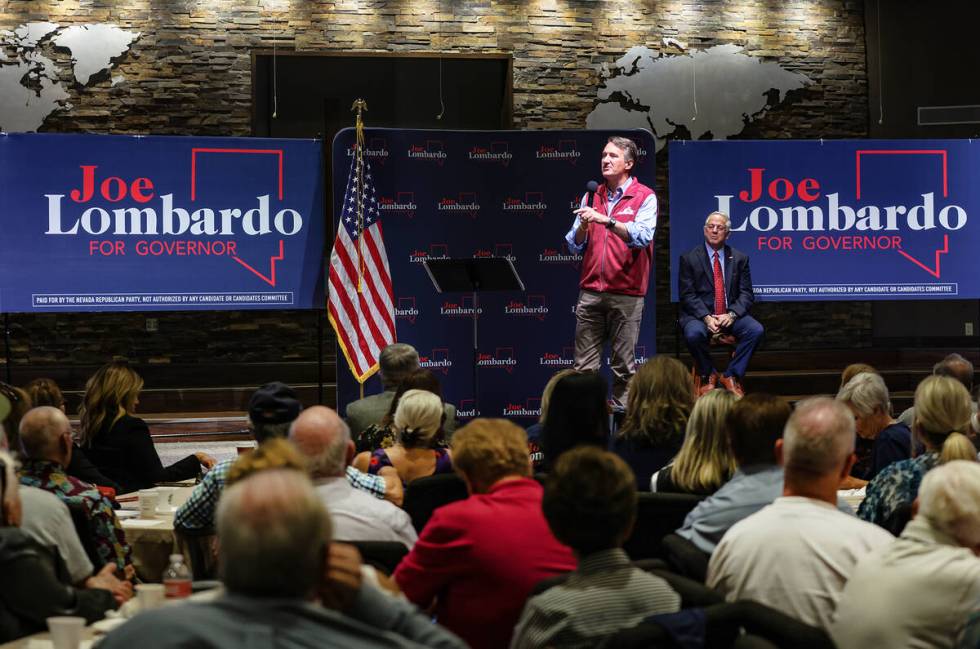 Glenn Youngkin, governor of Virginia, left, campaigns for Republican candidate for governor She ...