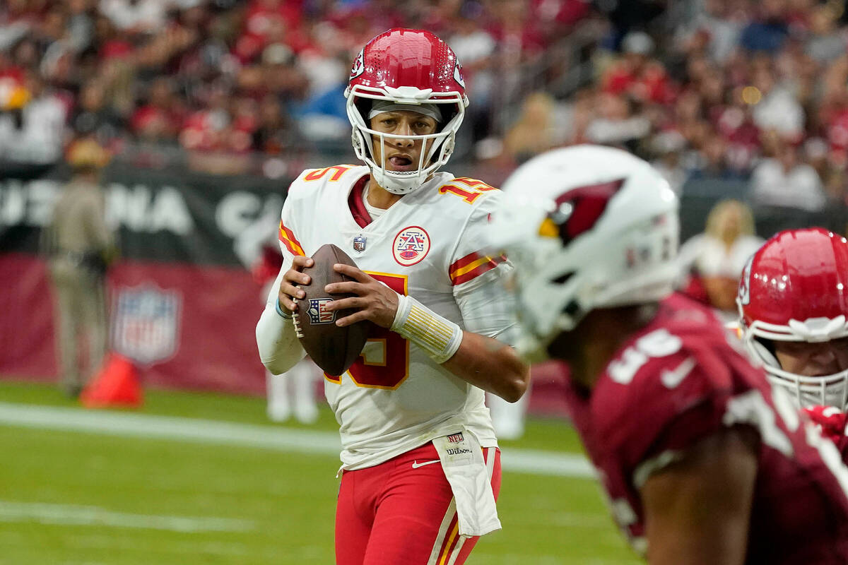 Kansas City Chiefs quarterback Patrick Mahomes (15) looks to pass against the Arizona Cardinals ...