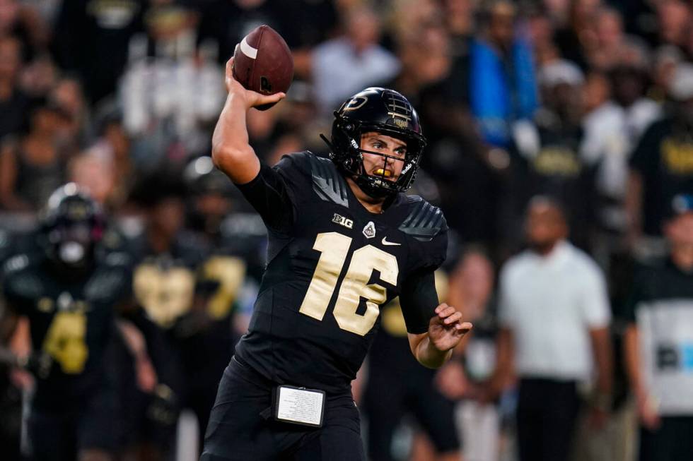 Purdue quarterback Aidan O'Connell (16) throws against Penn State during the first half of an N ...