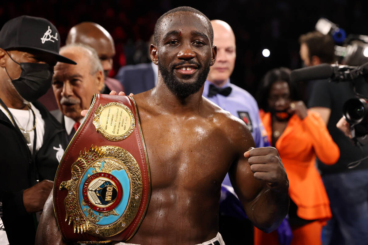Terence Crawford poses after his technical knockout win against Shawn Porter in the 10th round ...