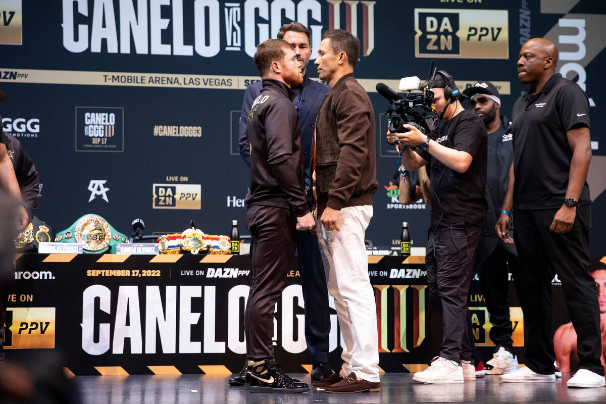Saul "Canelo" Alvarez, left, and Gennadiy Golovkin, right face off during a press con ...