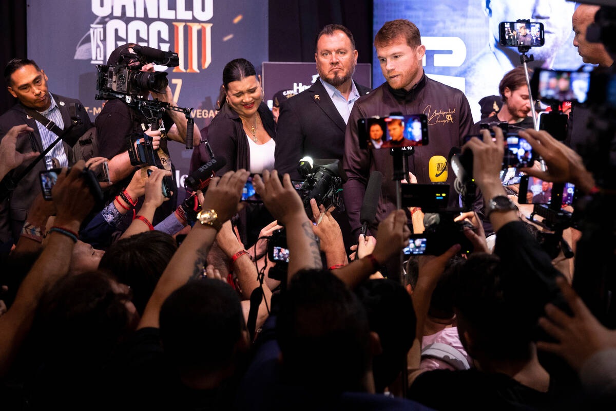 Saul "Canelo" Alvarez gives interviews following a press conference at the MGM Grand ...