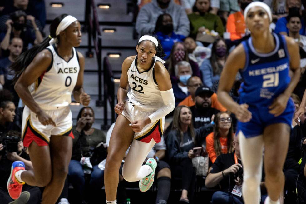 Las Vegas Aces forward A'ja Wilson (22), guard Jackie Young (0) and Connecticut Sun guard DiJon ...