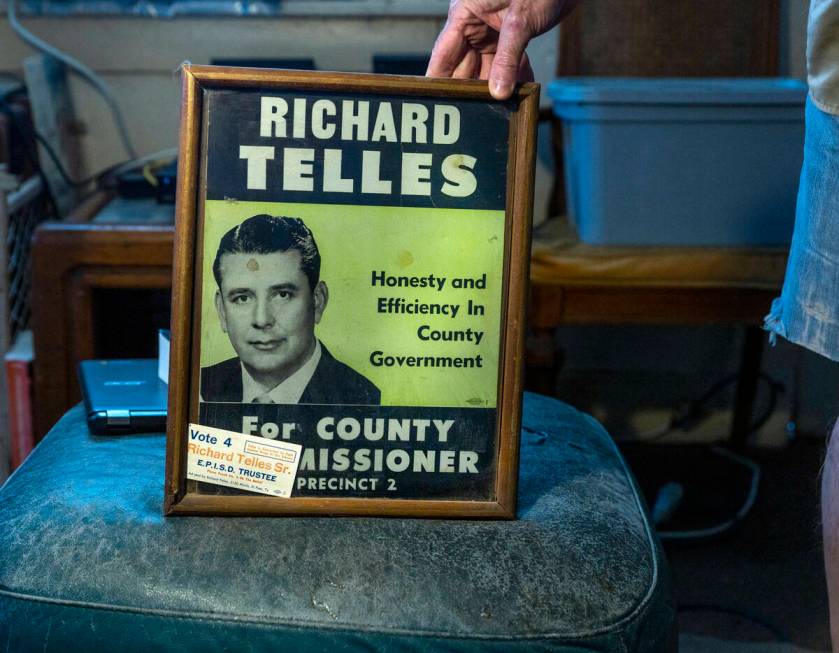Telles family friend George Thomas, at home with an old advertisement announcing Richard Telles ...