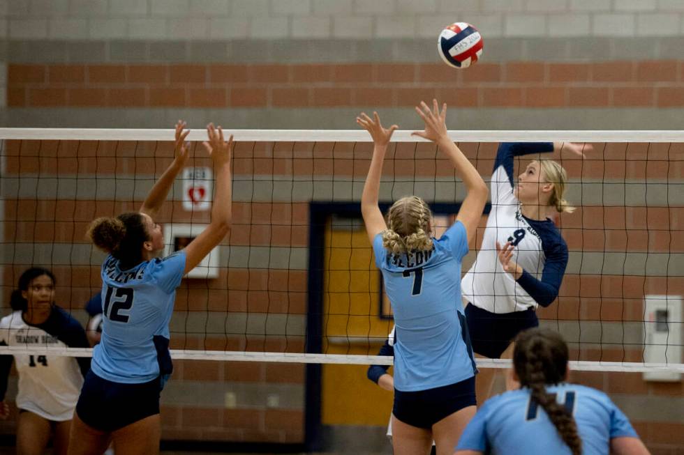Shadow Ridge's Lexi Luszeck (9) makes a hit during their match against Foothill High School on ...