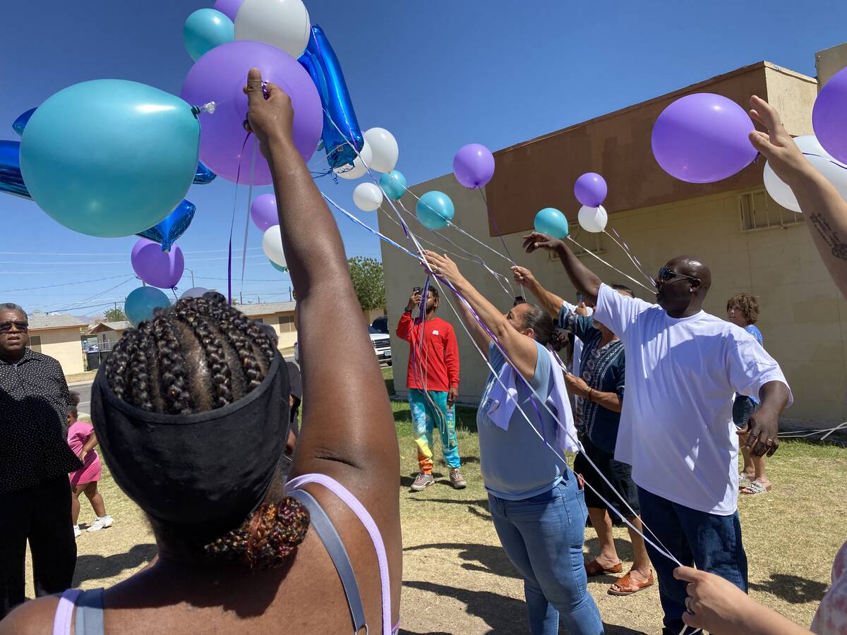 Makayla Adams' parents Monica and Donald Miner release balloons into the sky outside the Marble ...