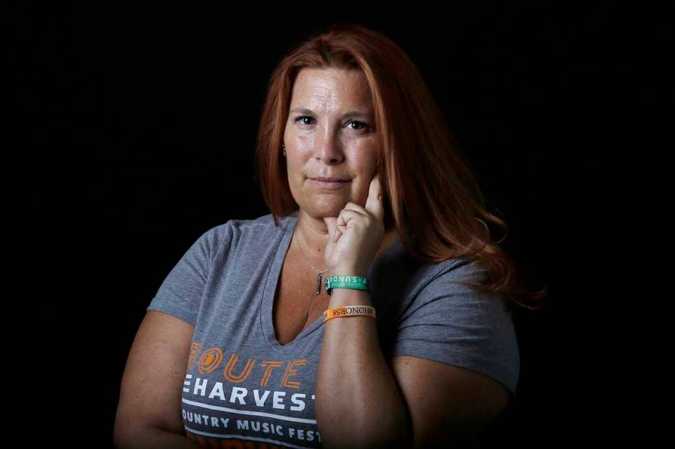 Heather Gooze, a Route 91 Harvest festival shooting survivor, poses for a photo at the Las Vega ...