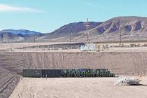FILE - Waste packages are shown at the end of landfill cell in Area 5 at the Nevada National Se ...