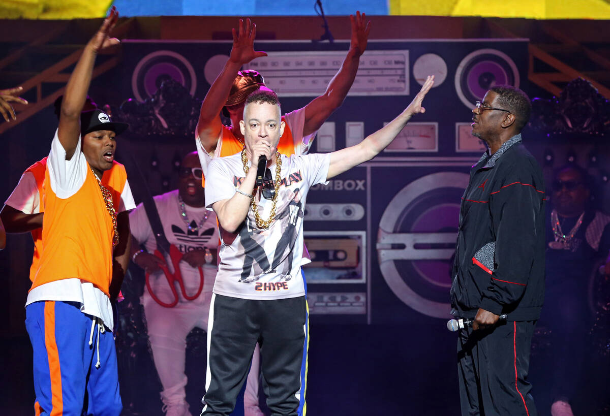 Rappers Christopher "Kid" Reid (C) and Christopher "Play" Martin (R) of Kid 'n Play perform dur ...
