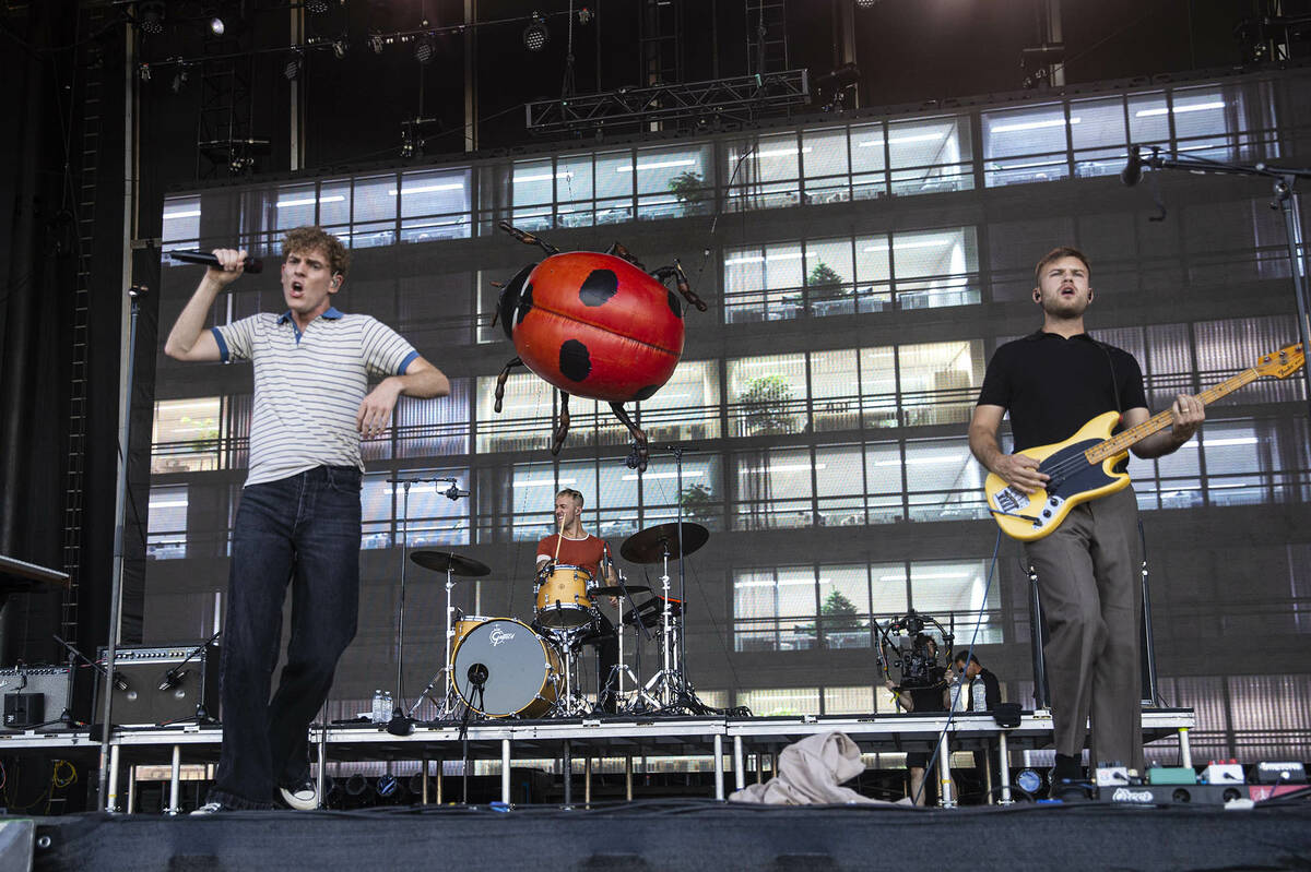 Members of Coin perform during the first day of the Life is Beautiful festival on Friday, Sept. ...
