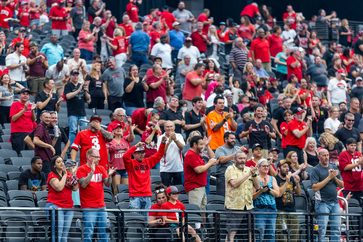 UNLV Rebels fans celebrate a score over the North Texas Mean Green during the first half of the ...
