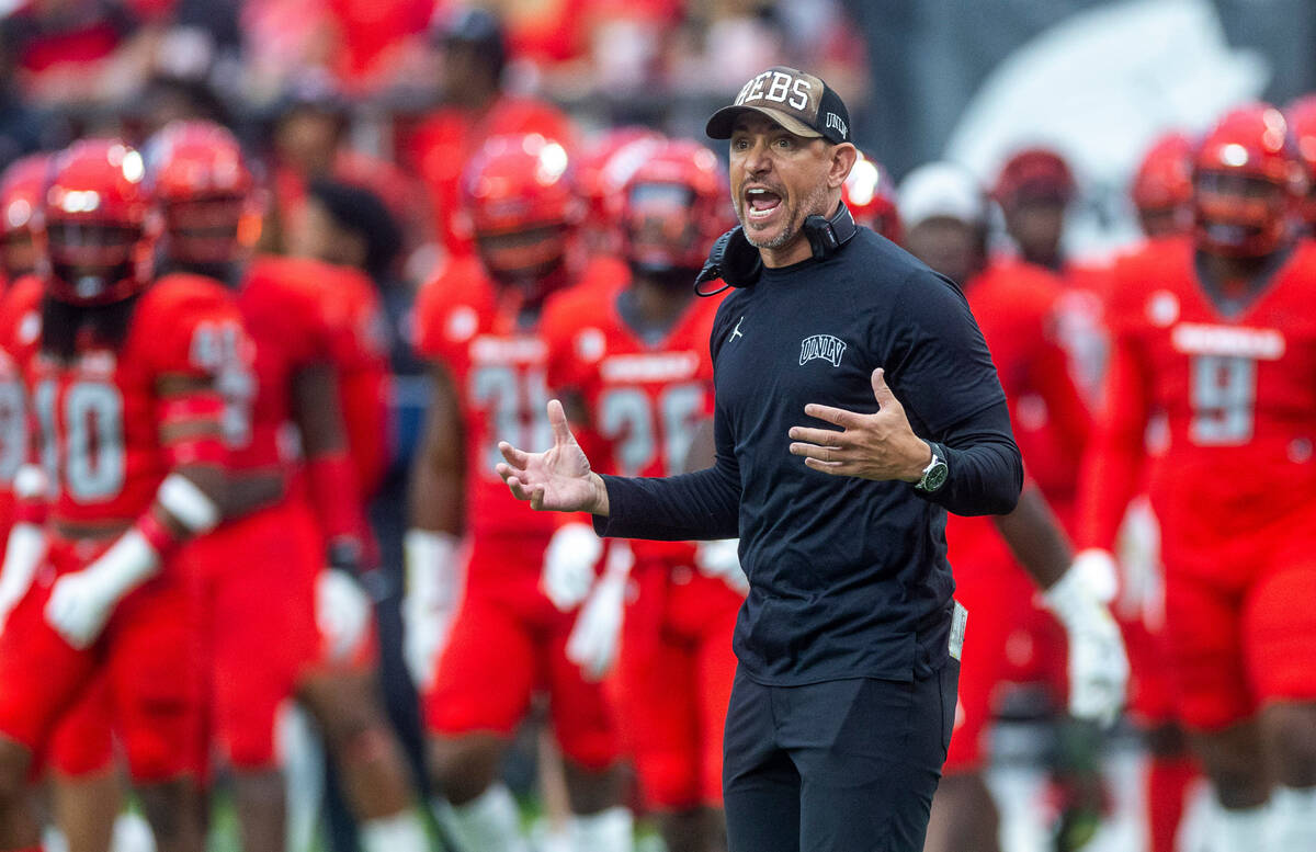 UNLV Rebels head coach Marcus Arroyo yells tops players versus the North Texas Mean Green durin ...