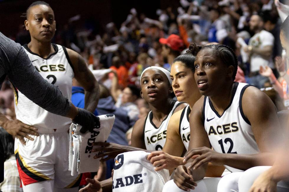 Las Vegas Aces guard Riquna Williams, left, guard Jackie Young, guard Kelsey Plum, and guard Ch ...