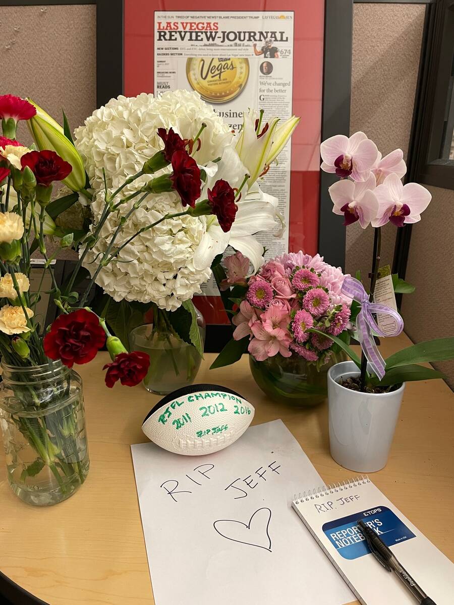 Flower, notes, and a small football appeared on Jeff German's desk in the Review-Journal newsro ...