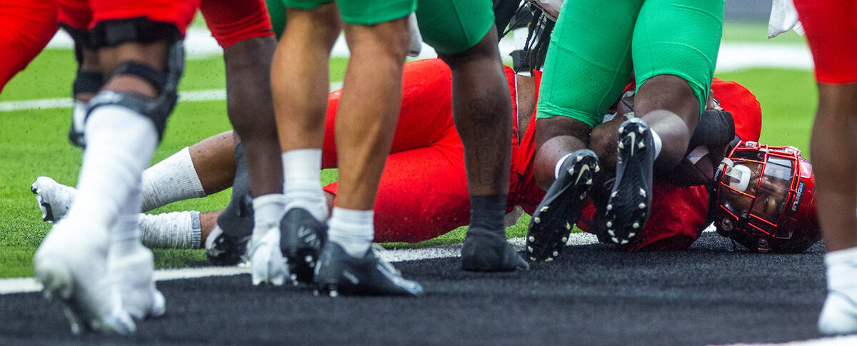 UNLV Rebels running back Aidan Robbins (9) dives into the end zone past North Texas Mean Green ...