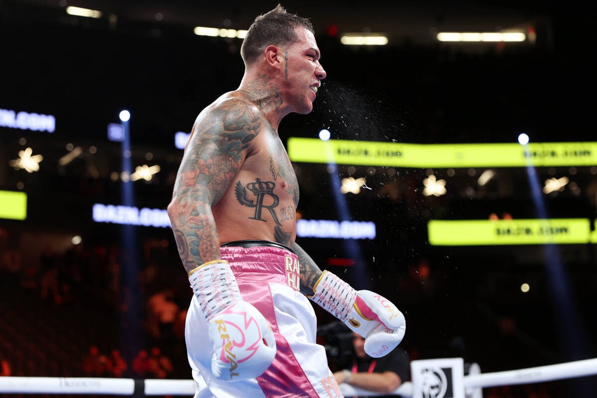 Gabriel Rosado walks to his corner after the third round of a super middleweight fight against ...