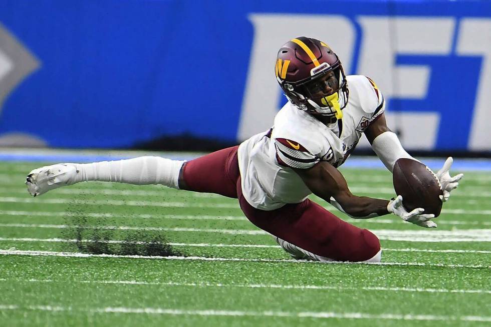 Washington Commanders wide receiver Terry McLaurin (17) makes a catch during the second half of ...