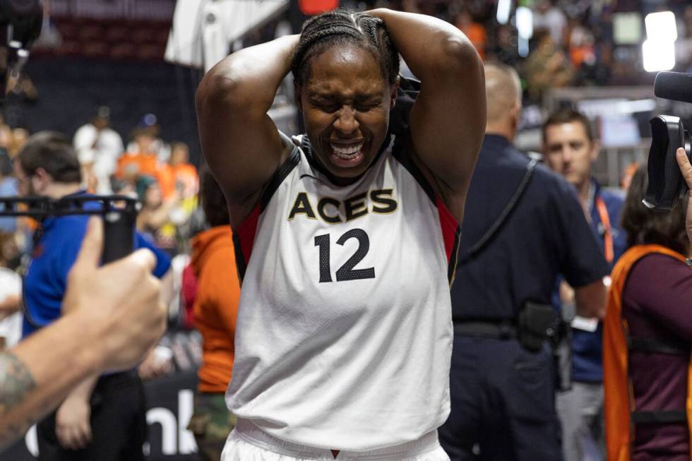 Las Vegas Aces guard Chelsea Gray (12) is in awe after her team won the 2022 WNBA Championship ...