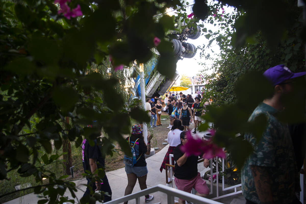 Attendees walk around Fergusons during the Life is Beautiful festival on Sunday, Sept. 18, 2022 ...