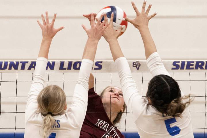 Faith Lutheran’s Bianca Richardson (6) has her shot contested by Sierra Vista’s M ...