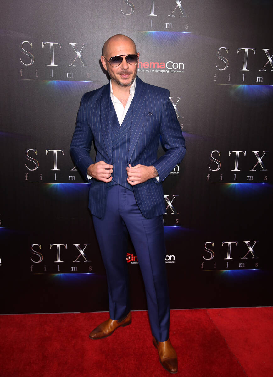 Pitbull arrives at CinemaCon red carpet at The Colosseum at Caesars Palace on Tuesday, April 2, ...