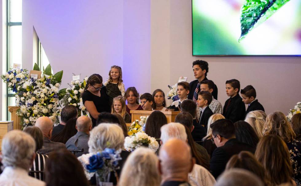 Family members recite a hymn during a funeral service for Las Vegas City Councilman Steve Ross ...