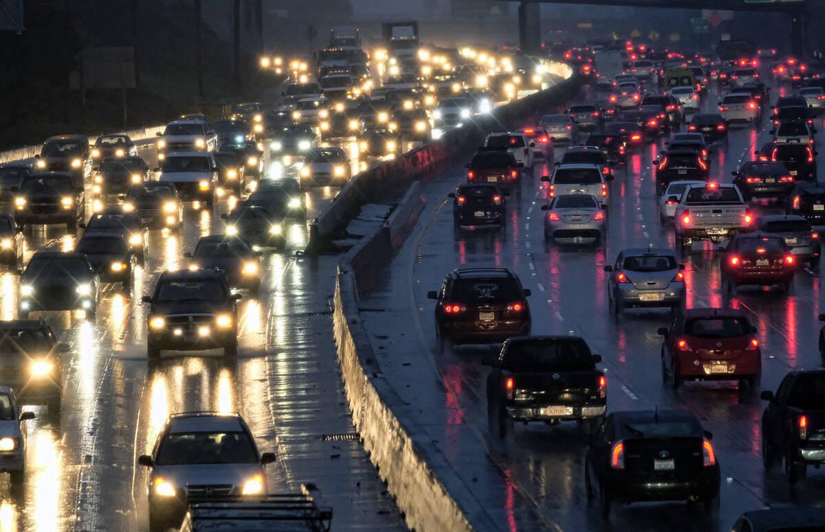 FILE - In this Jan. 12, 2017 file photo, early morning rush hour traffic crawls along the Holly ...