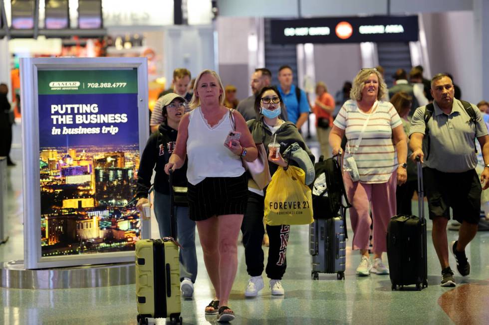 Passengers in baggage claim in Terminal 1 at Harry Reid International Airport Wednesday, June 1 ...