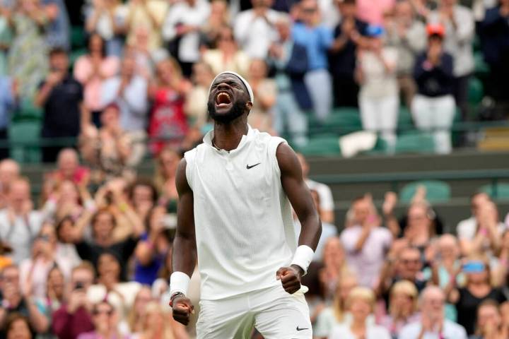 Frances Tiafoe of the U.S. celebrates after winning the men's singles match against Stefanos Ts ...