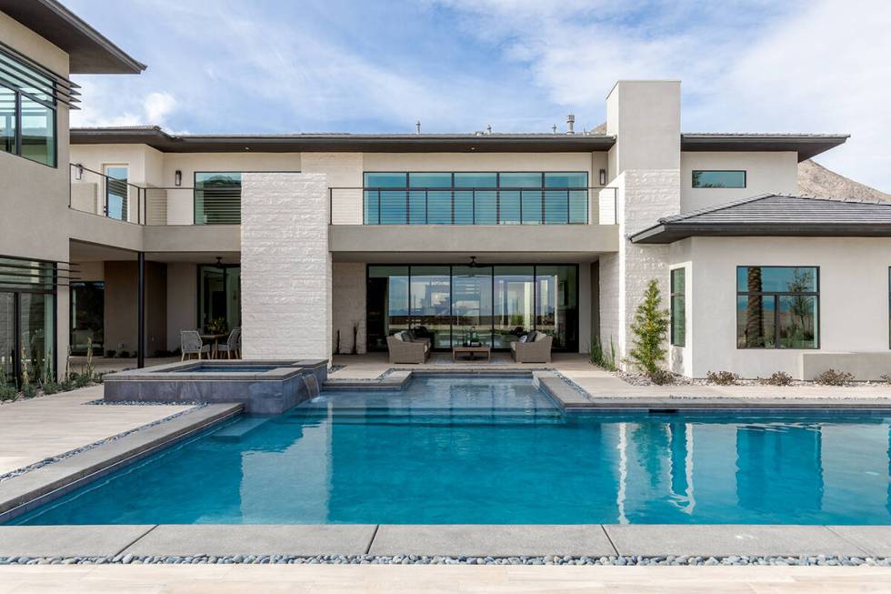 It measures 8,900 square feet with seven bedrooms, nine baths and a six-car garage. (Coldwell B ...