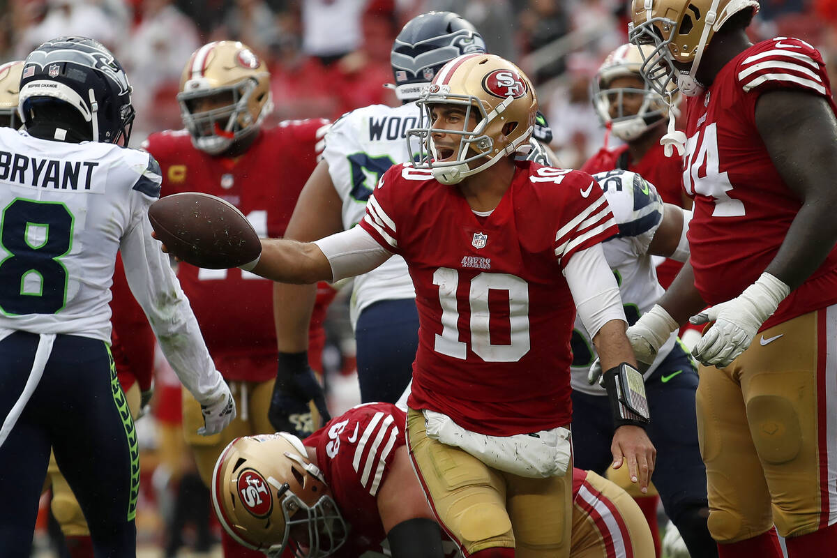 San Francisco 49ers quarterback Jimmy Garoppolo (10) reacts during the second half of an NFL fo ...