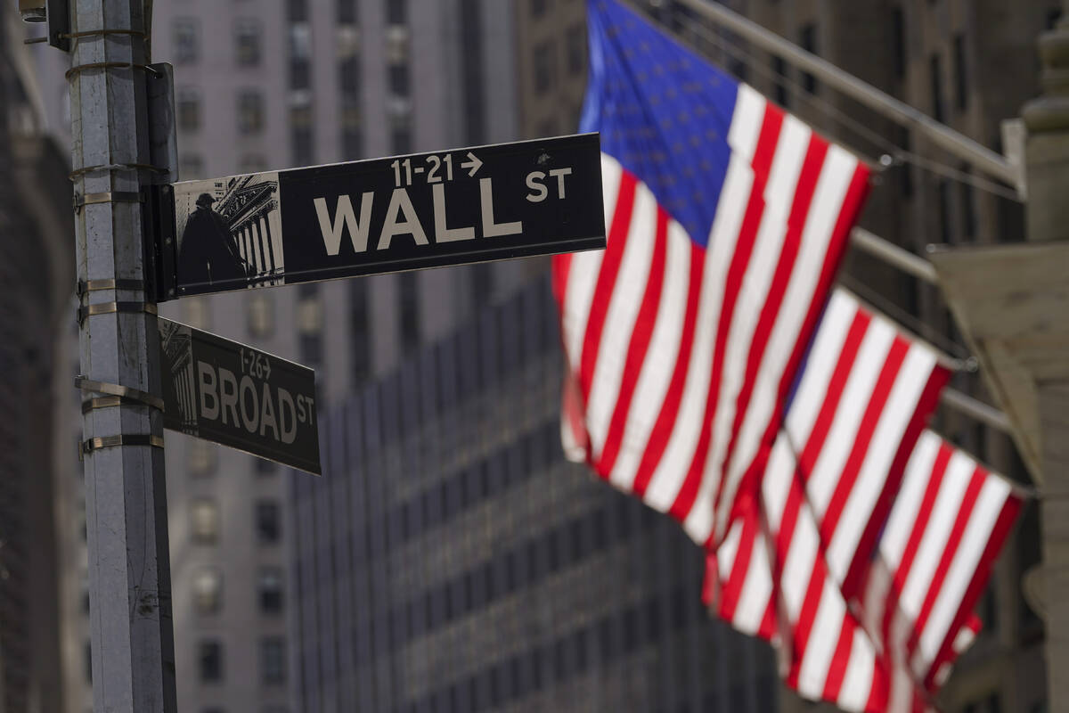 American flags fly outside the New York Stock Exchange, Friday, Sept. 23, 2022, in New York. St ...