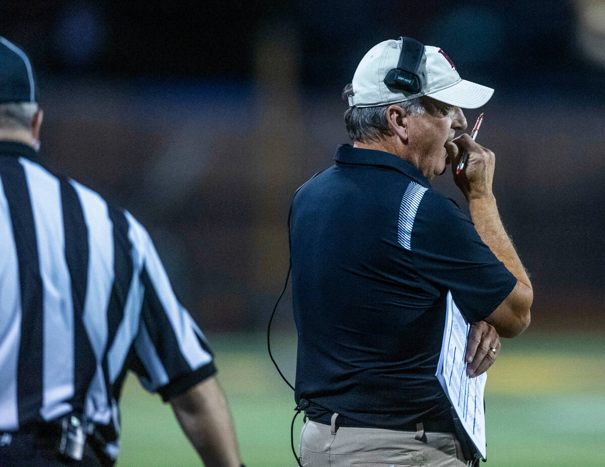 Faith Lutheran Head Coach Mike Sanford is a bit concerned as Liberty scores again during the fi ...