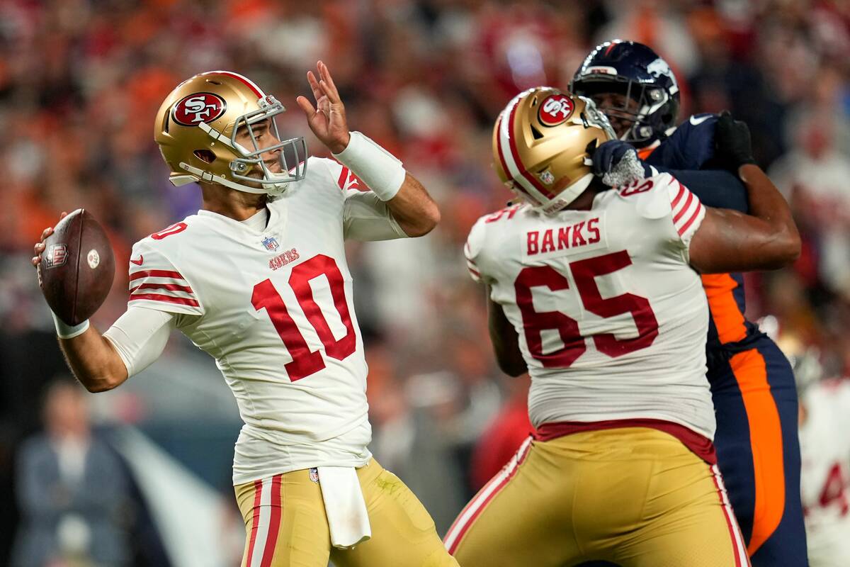 San Francisco 49ers quarterback Jimmy Garoppolo (10) passes against the Denver Broncos during t ...