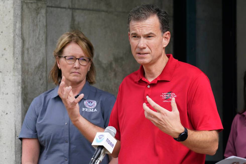 FEMA administrator Deanne Criswell, left, listens to Jamie Rhome, the Acting Director of the Na ...